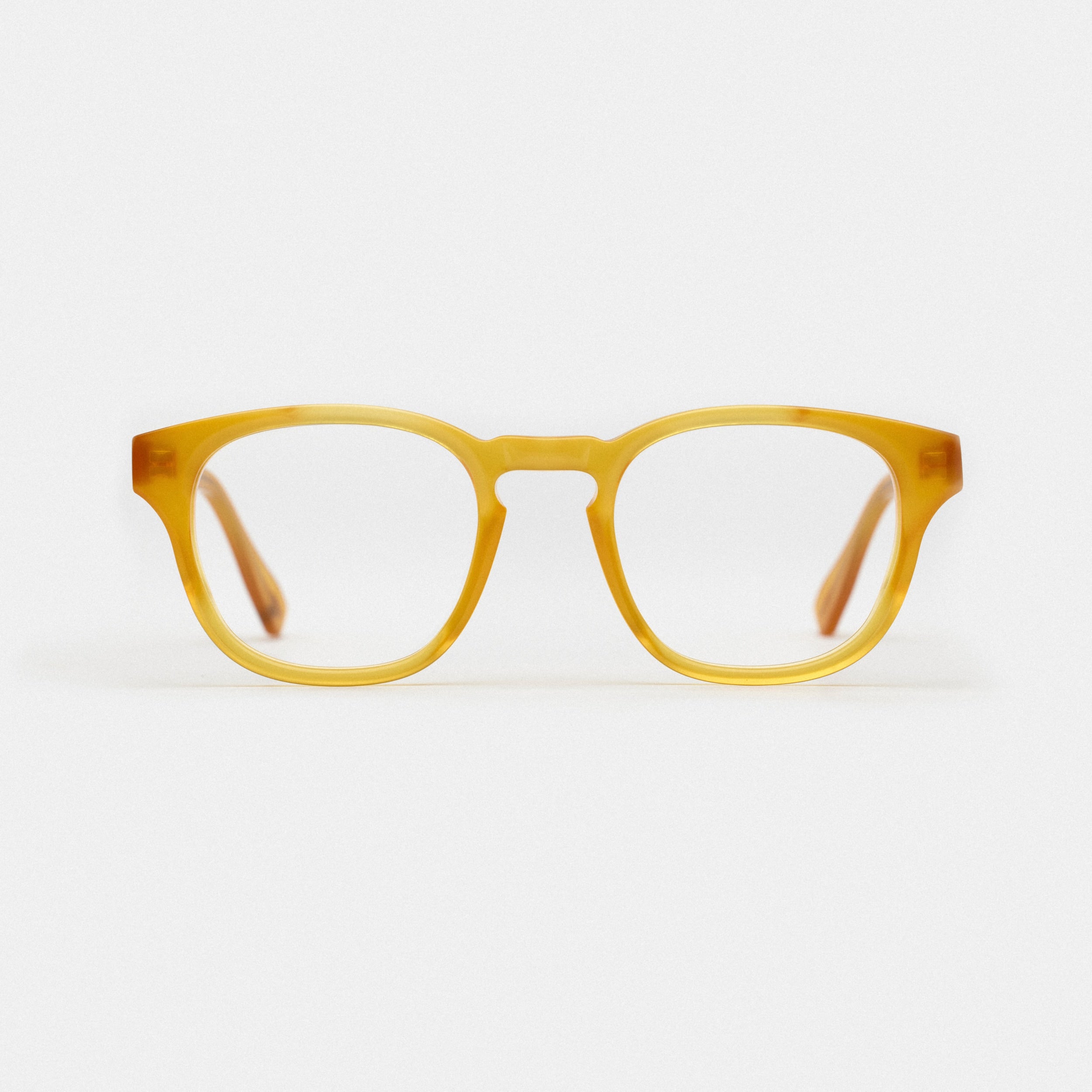 "Ajoutez une touche de chaleur à votre look avec cette paire de lunettes de vue couleur miel pour femme ou homme. Avec leur monture en plastique légère et leur teinte de couleur miel douce, ces lunettes sauront rehausser votre style tout en vous offrant un confort optimal. Découvrez notre sélection de lunettes de vue pour femmes et pour hommes sur notre site internet et trouvez la paire qui vous convient pour un look confortable et tendance au quotidien